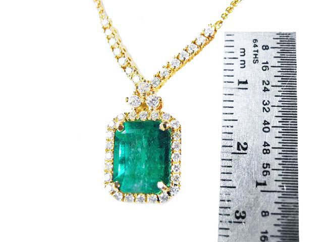 Solid gold emerald necklace