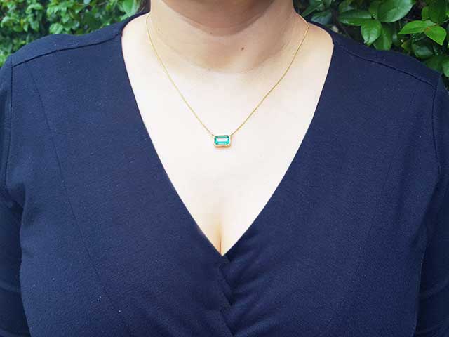 Emerald bezel set necklace