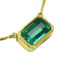 From Muzo Colombian emerald bezel set necklace