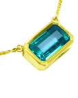 From Muzo Colombian emerald bezel set necklace