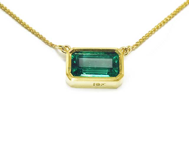 Slider Colombian emerald bezel set necklace