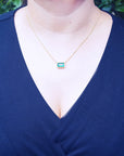 Emerald bezel set necklace