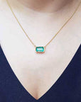 Emerald-cut bezel set emerald necklace