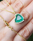 Solid yellow gold necklace with heart emerald