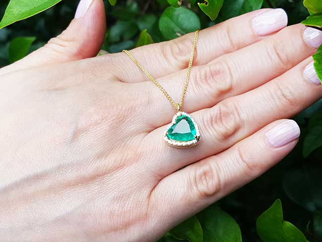 Medium green Colombian emerald heart necklace