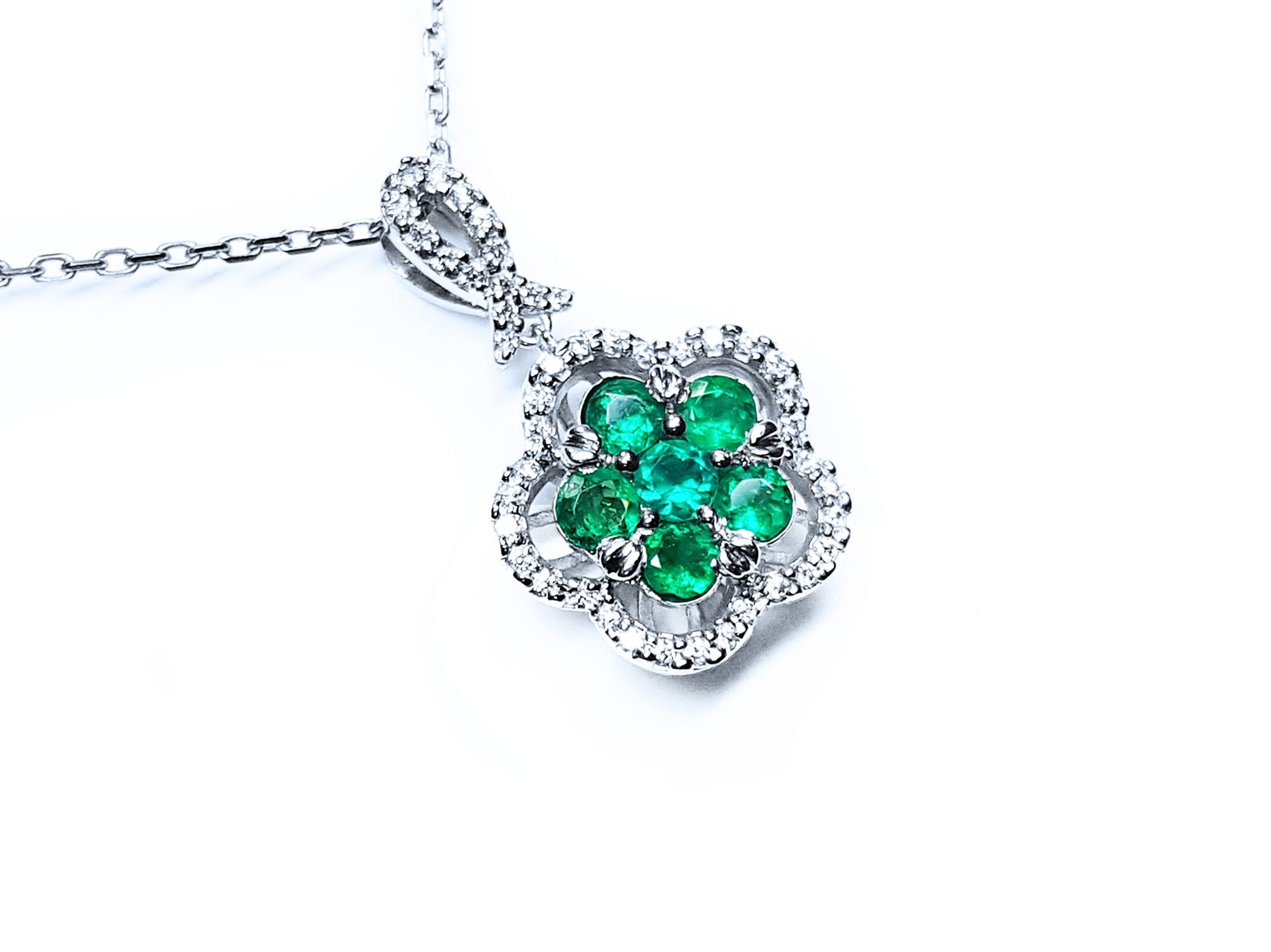 Emerald and diamond cluster necklace