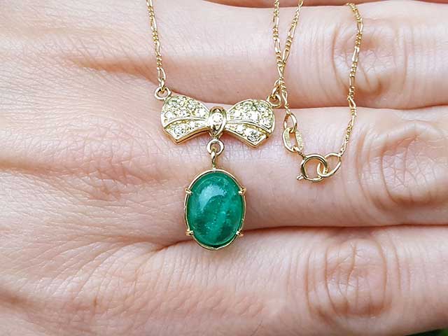 Genuine bow tie emerald necklace for sale