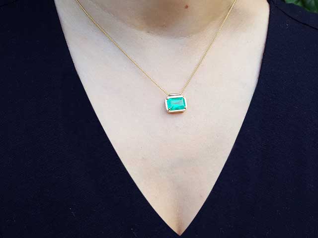 Genuine solitaire emerald necklace