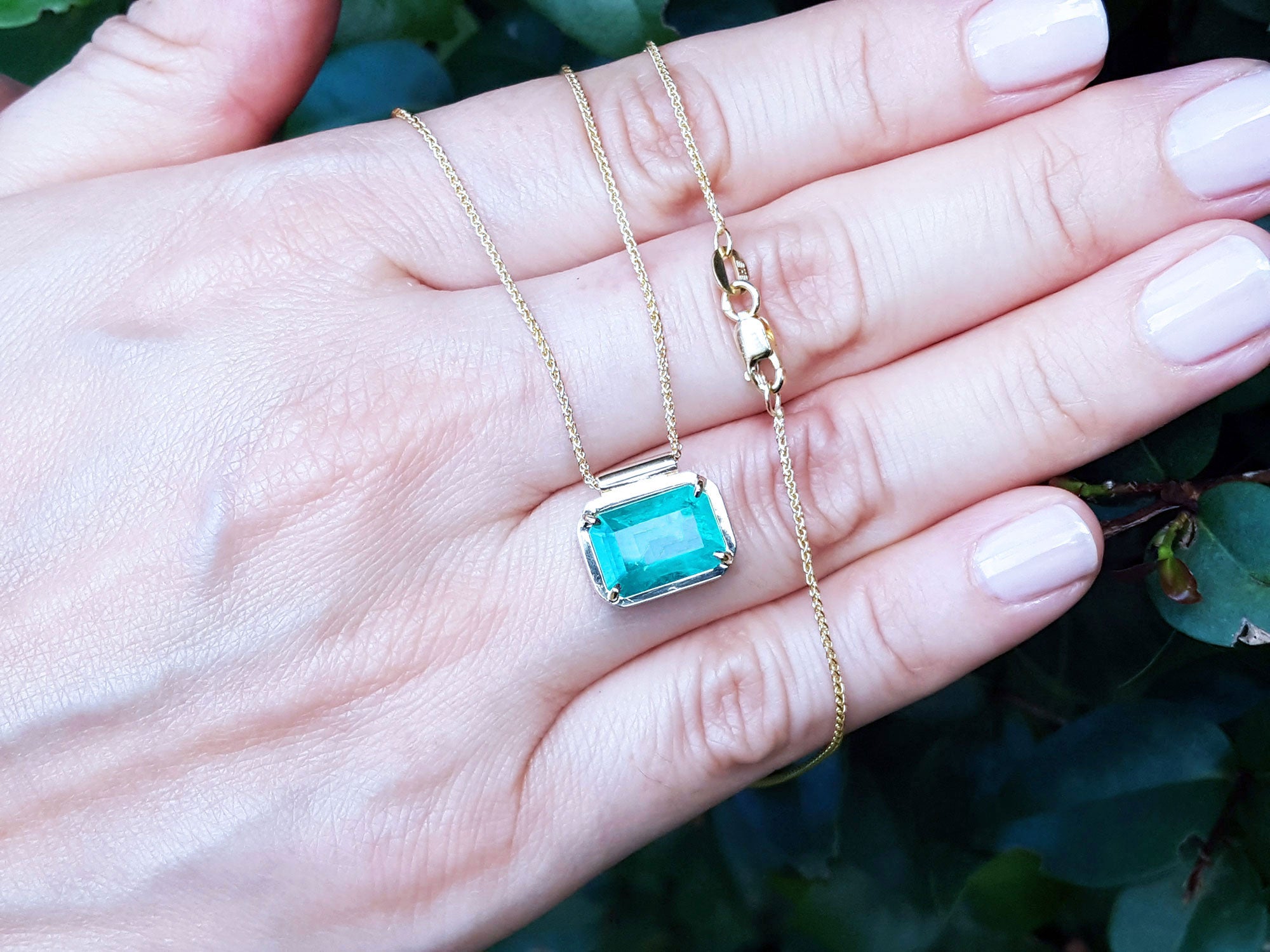 Emerad-cut Emerald solitaire necklaces