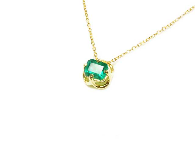 Emerald-cut emerald tulip necklace