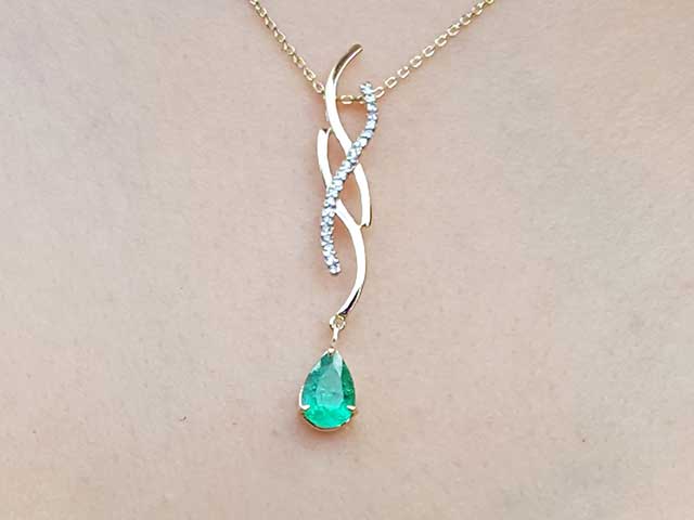 Dangle pear cut emerald necklace