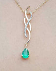 Dangle pear cut emerald necklace
