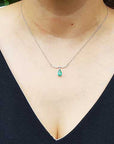 Emerald white gold necklace