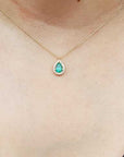 Pear cut halo diamond necklace