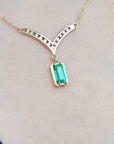 Yellow gold emerald necklace