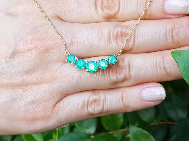 Yellow gold fine emerald jewelry