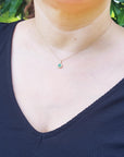 round cut emerald necklace