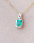 Yellow gold emerald necklace