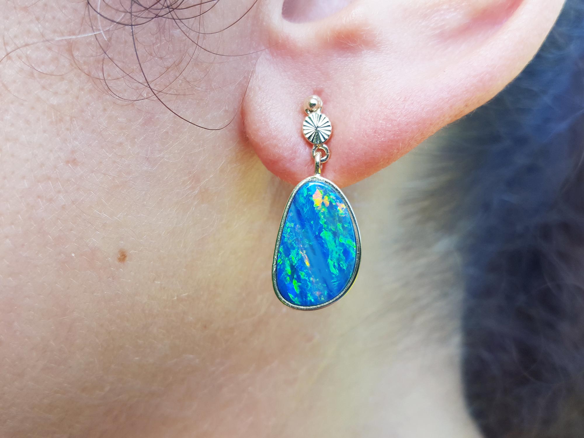 Yellow gold opal earrings