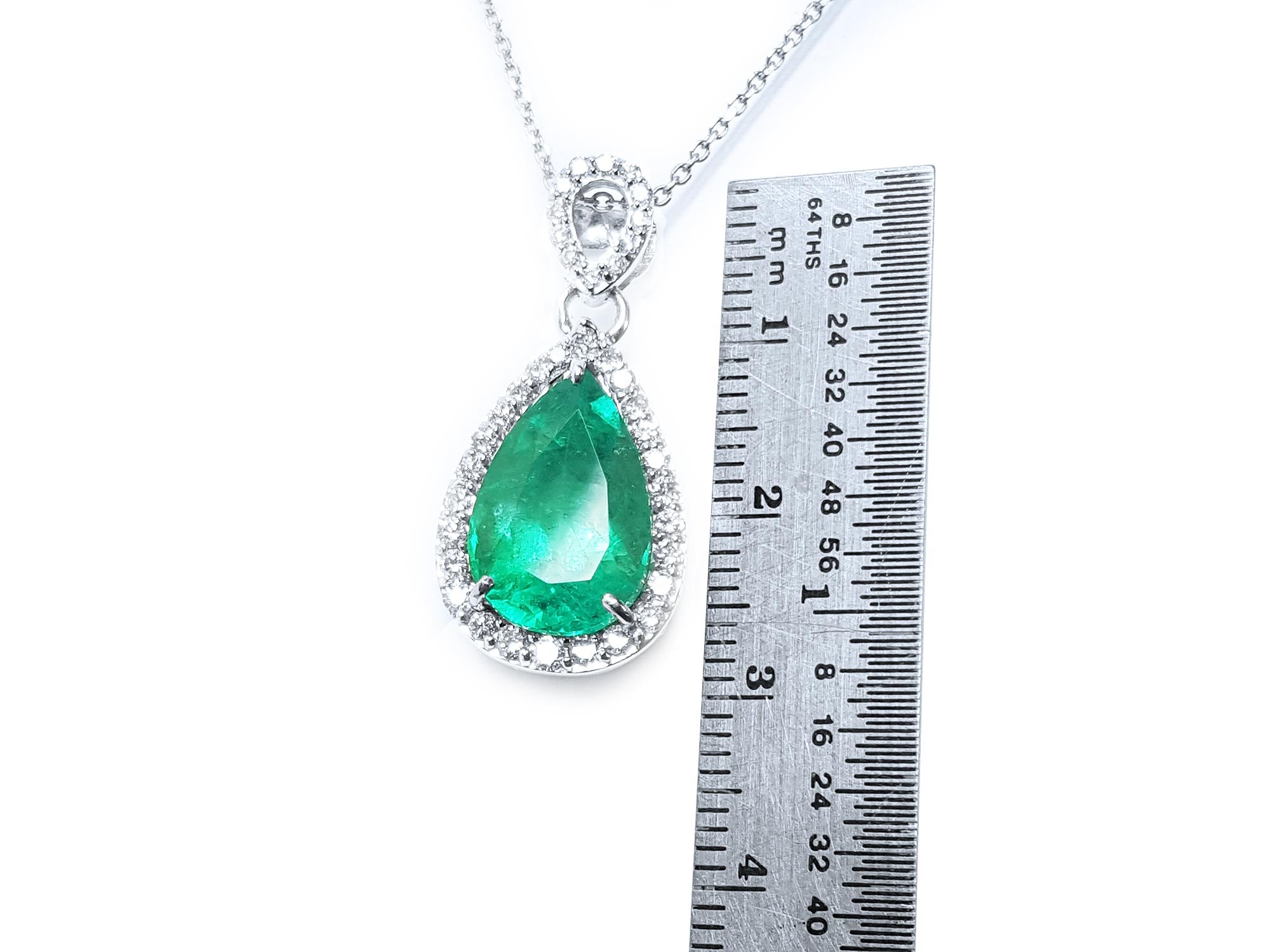 Emerald and diamond pendant