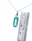 18k gold emerald pendant