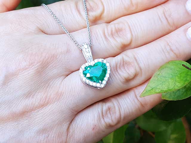 Unique emerald and diamond pendant