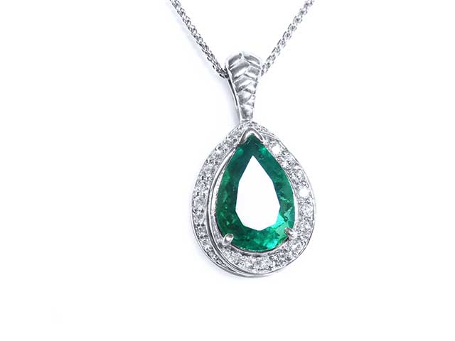 Hand made solid gold emerald pendant