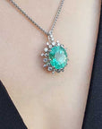 Emerald and diamond pendant