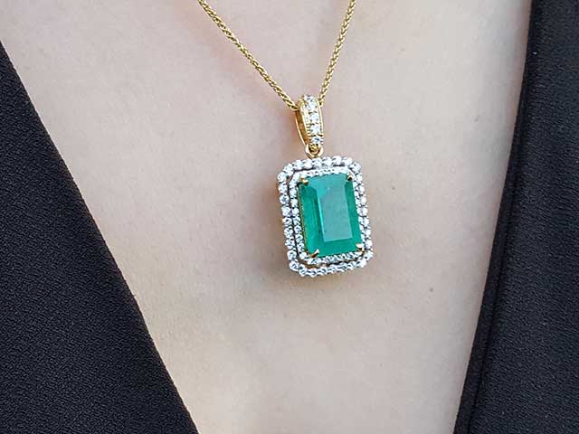 Emerald-cut emerald pendant