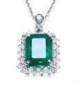 Solid gold emerald pendant