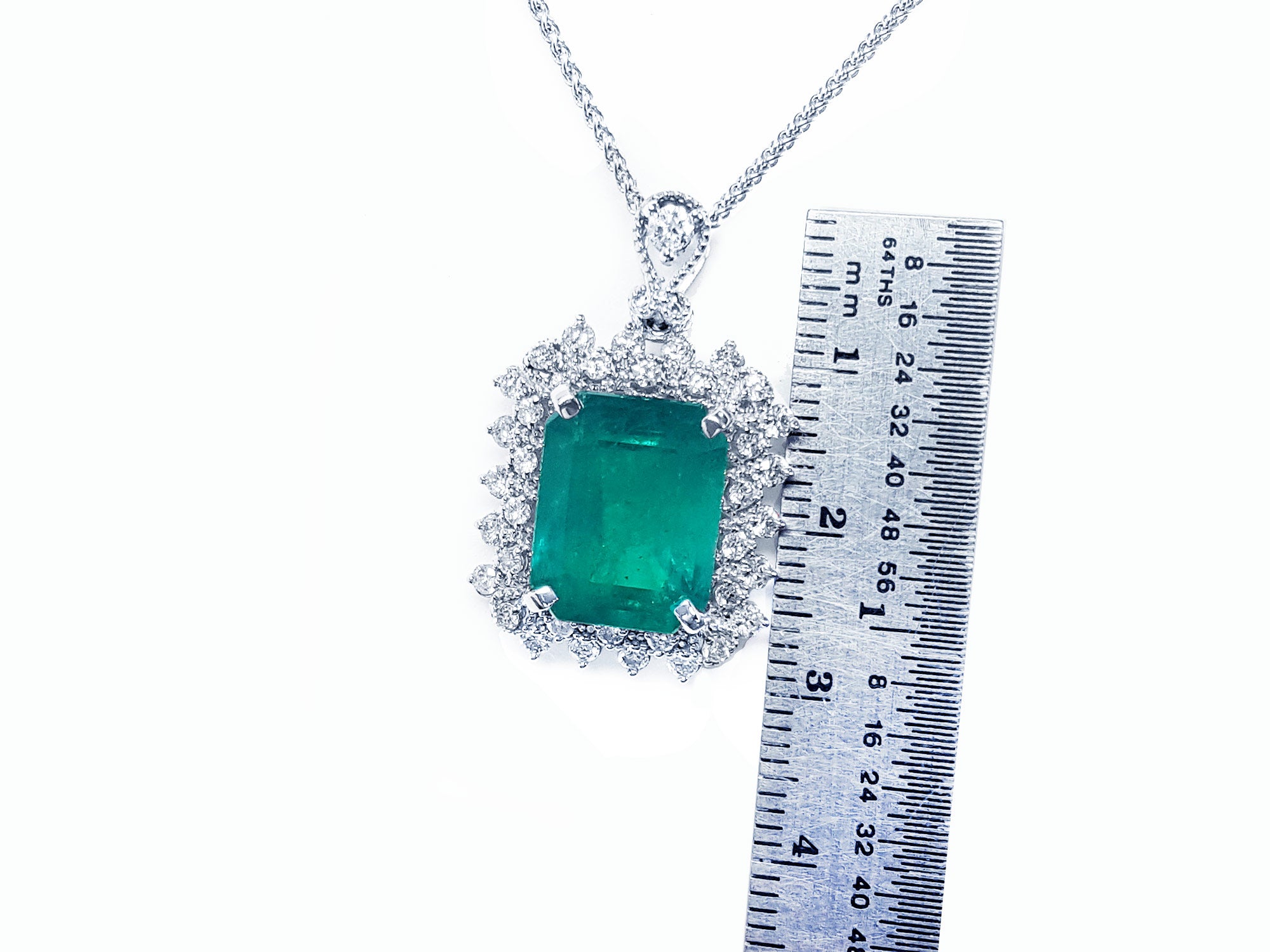 Emerald and diamond pendant