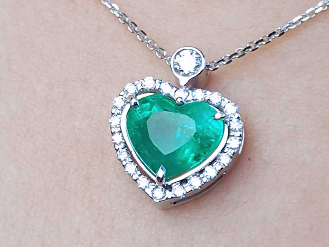 Emerald and diamond heart pendant