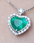 Emerald and diamond heart pendant
