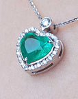 Halo emerald heart pendant