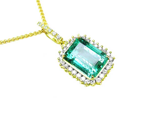 Deep green Colombian emeralds pendant