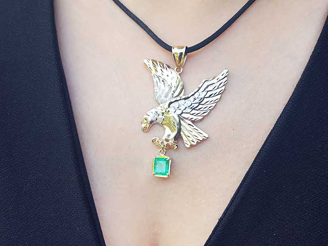 Solid gold emerald eagle pendant