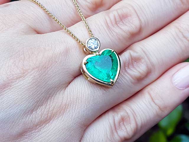 Modern emerald pendant fine jewelry