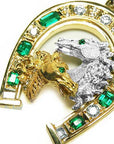 Horseshoe emerald pendant