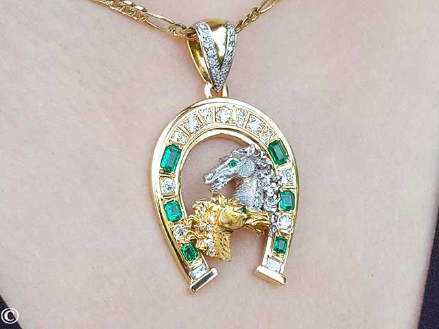 Green emerald horseshoe pendant