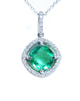 White gold oval emerald pendant