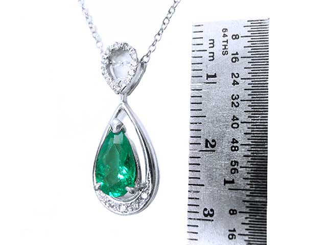 Pear shaped emerald and diamond pendant