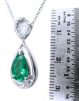 Pear shaped emerald and diamond pendant