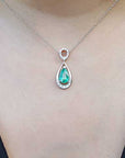 Slider dangling emerald pendant