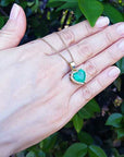 Real emerald and gold pendant