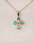 Colombian emerald cross pendant