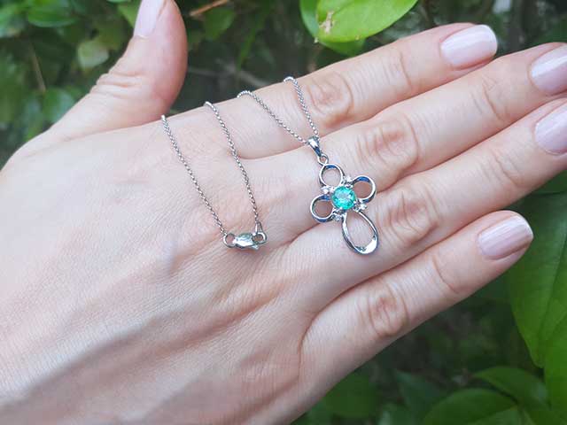 Emerald and diamond fine jewelry pendants