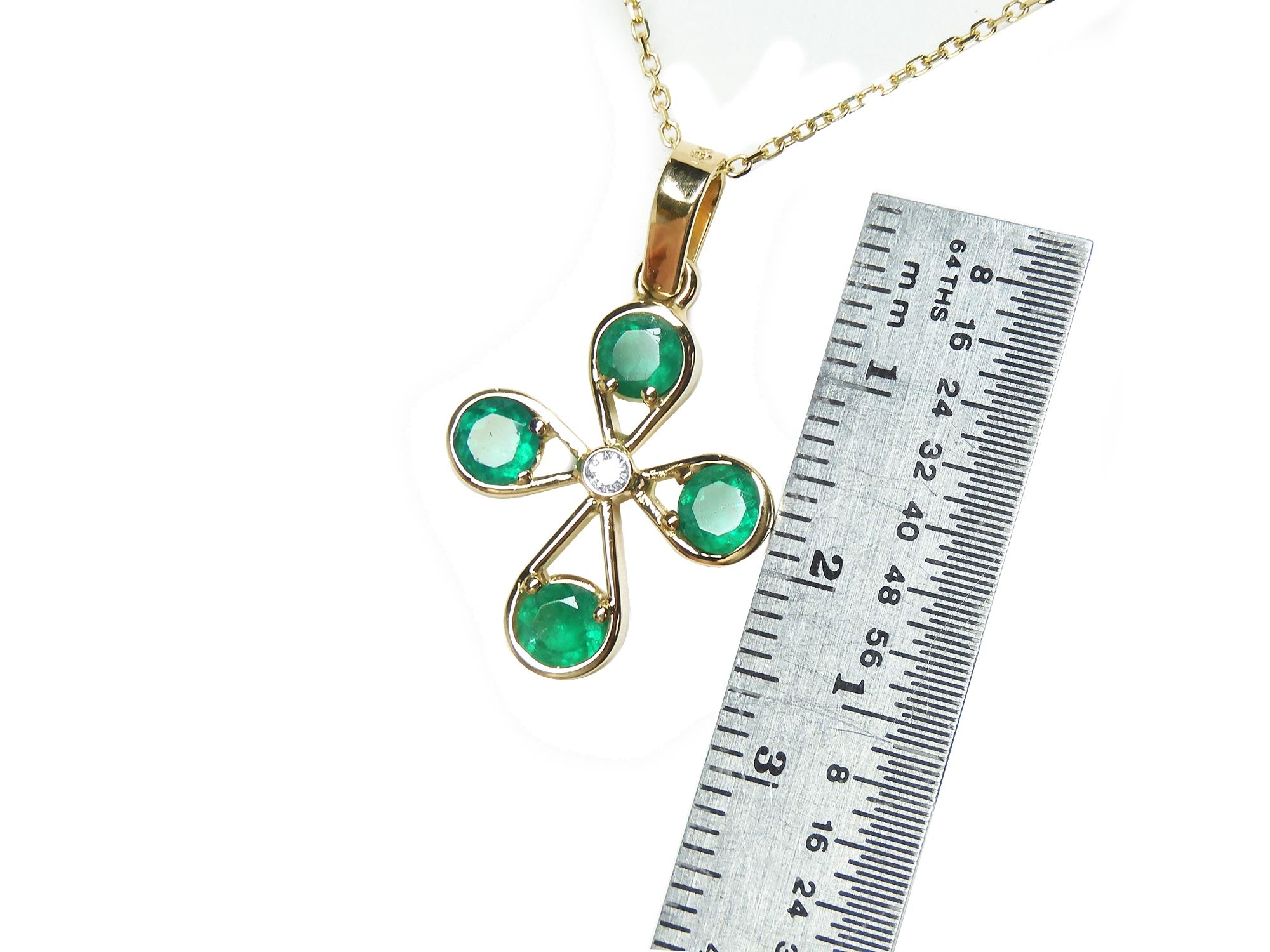 18k emerald cross pendant