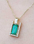 Hand made solid gold emerald pendant