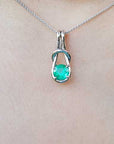 Round cut emerald pendant necklace