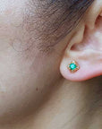 Tulip emerald stud earrings